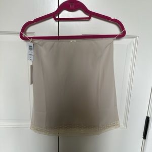 Aritzia cream mini skirt